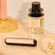 Ploom AURA priekiniai dangteliai Rose Gold, padėti ant staliuko